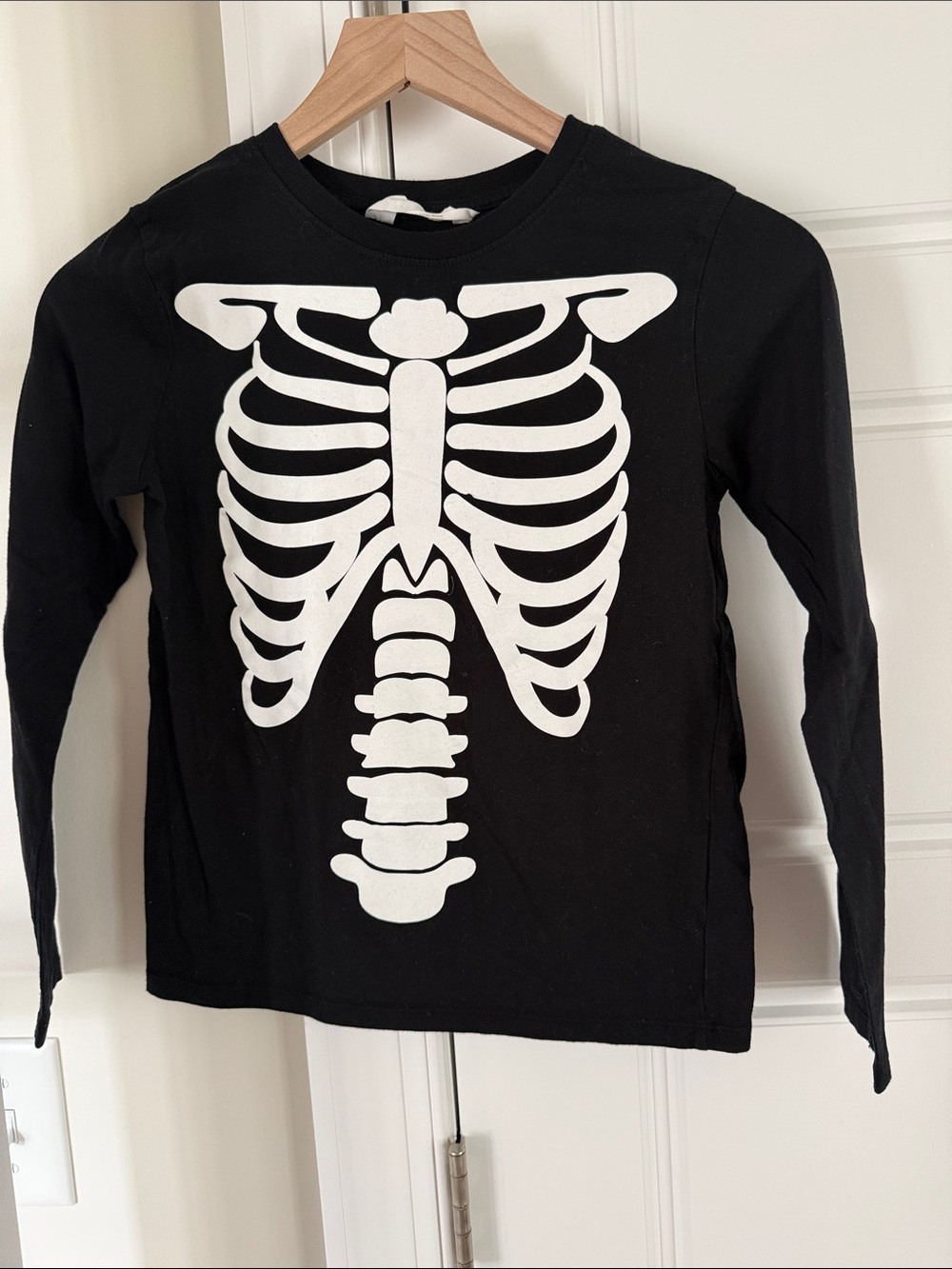 H&M Black Long-Sleeve Tee with White Skeleton Graphic